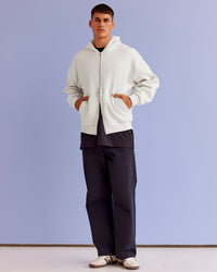 Man wearing Base Zip Through Oversized Hoodie - Silver Marl | Model:Jackson | Size:L