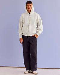 Man wearing Base Zip Through Oversized Hoodie - Silver Marl | Model:Jackson | Size:L