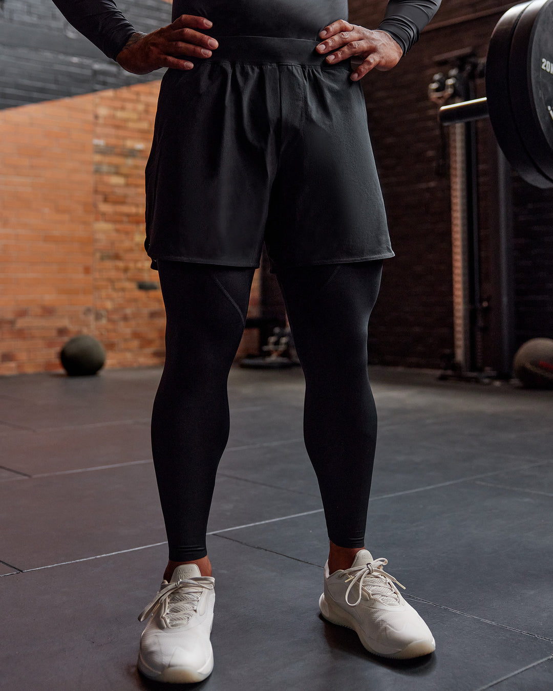 Man wearing BaseTech 26" Leggings - Black | Model:Paris | Size:L