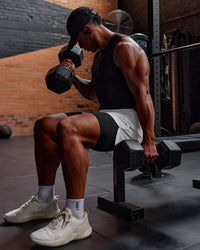 Man wearing BaseTech 8" Shorts - Black | Model:Paris | Size:L