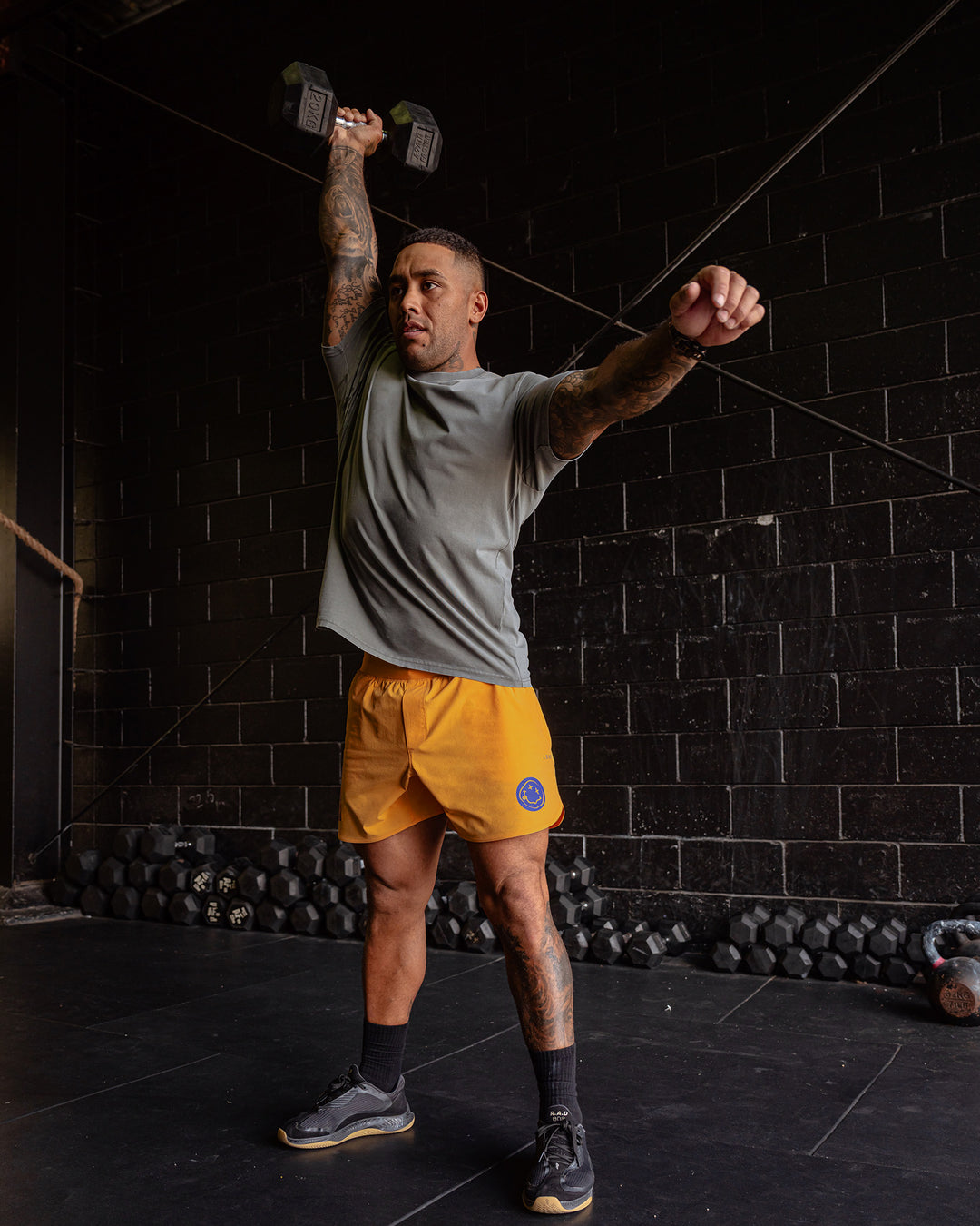 Man wearing CFT BNE 25 Lift 6&quot; Short - Warm Apricot-Purple Opulence | Model:Mathias | Size:L