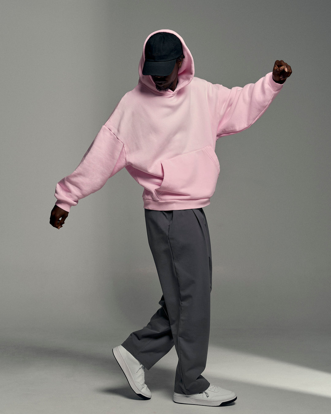 Man wearing Memory In Motion Ultra Heavyweight Washed Hoodie - Marshmallow Washed | Model:Okello | Size:L