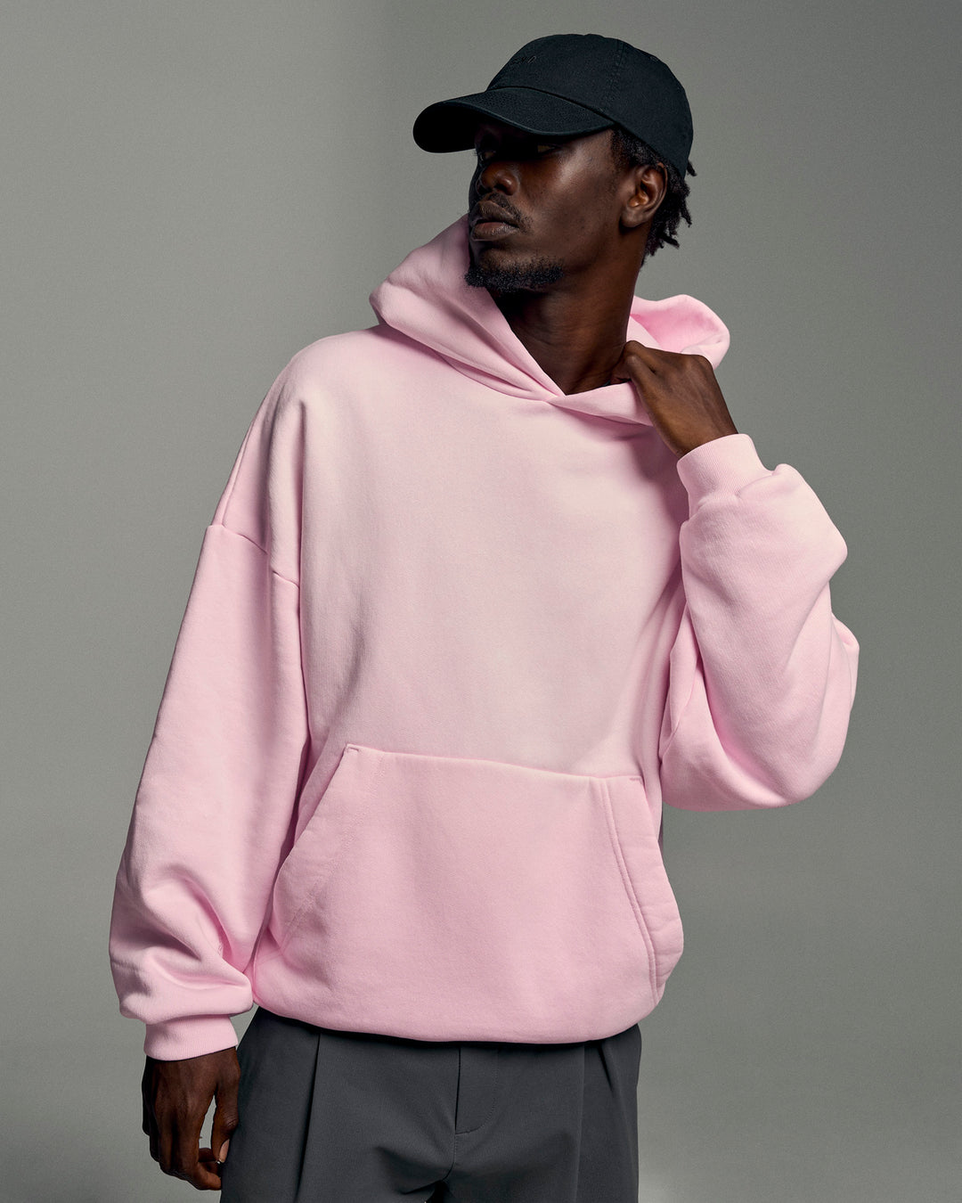 Man wearing Memory In Motion Ultra Heavyweight Washed Hoodie - Marshmallow Washed | Model:Okello | Size:L