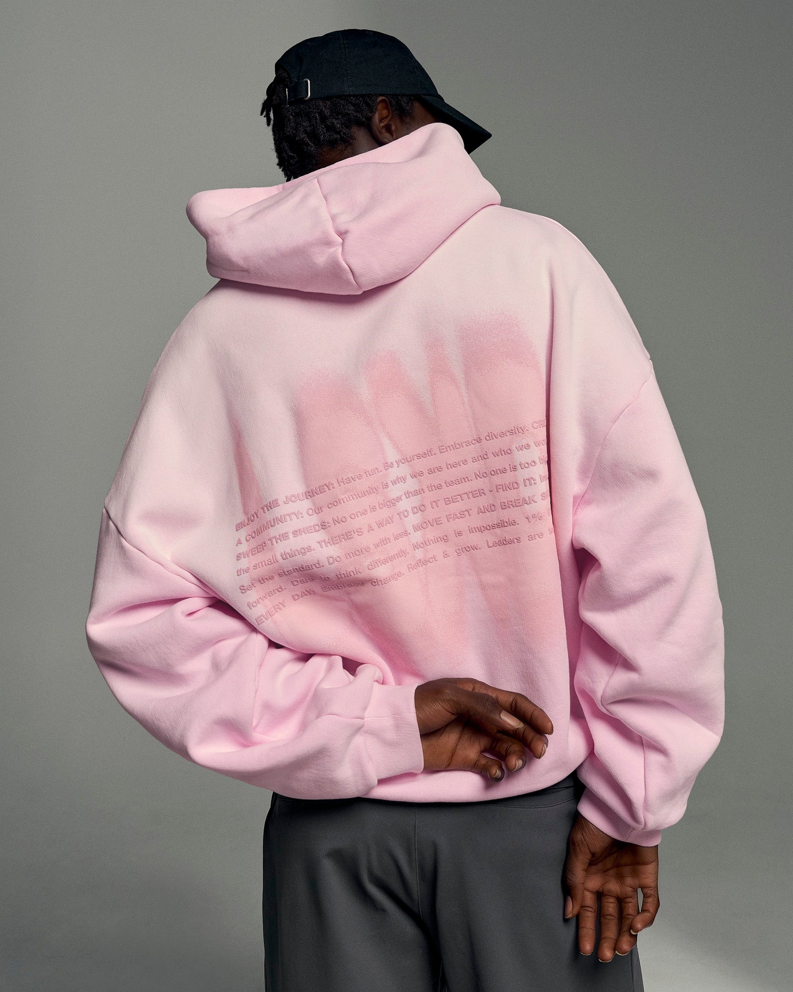Man wearing Memory In Motion Ultra Heavyweight Washed Hoodie - Marshmallow Washed | Model:Okello | Size:L