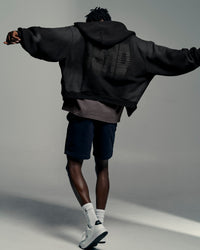 Man wearing Memory in Motion Ultra Heavyweight Zip Thru Hoodie - Black Washed | Model:Okello | Size:L | Thumbnail Index: 2