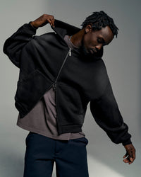 Man wearing Memory in Motion Ultra Heavyweight Zip Thru Hoodie - Black Washed | Model:Okello | Size:L | Thumbnail Index: 1