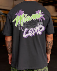 Man wearing Miami Snatch FLXCotton Oversized Tee - Dark Storm-Marshmallow | Model:Hiko | Size:L