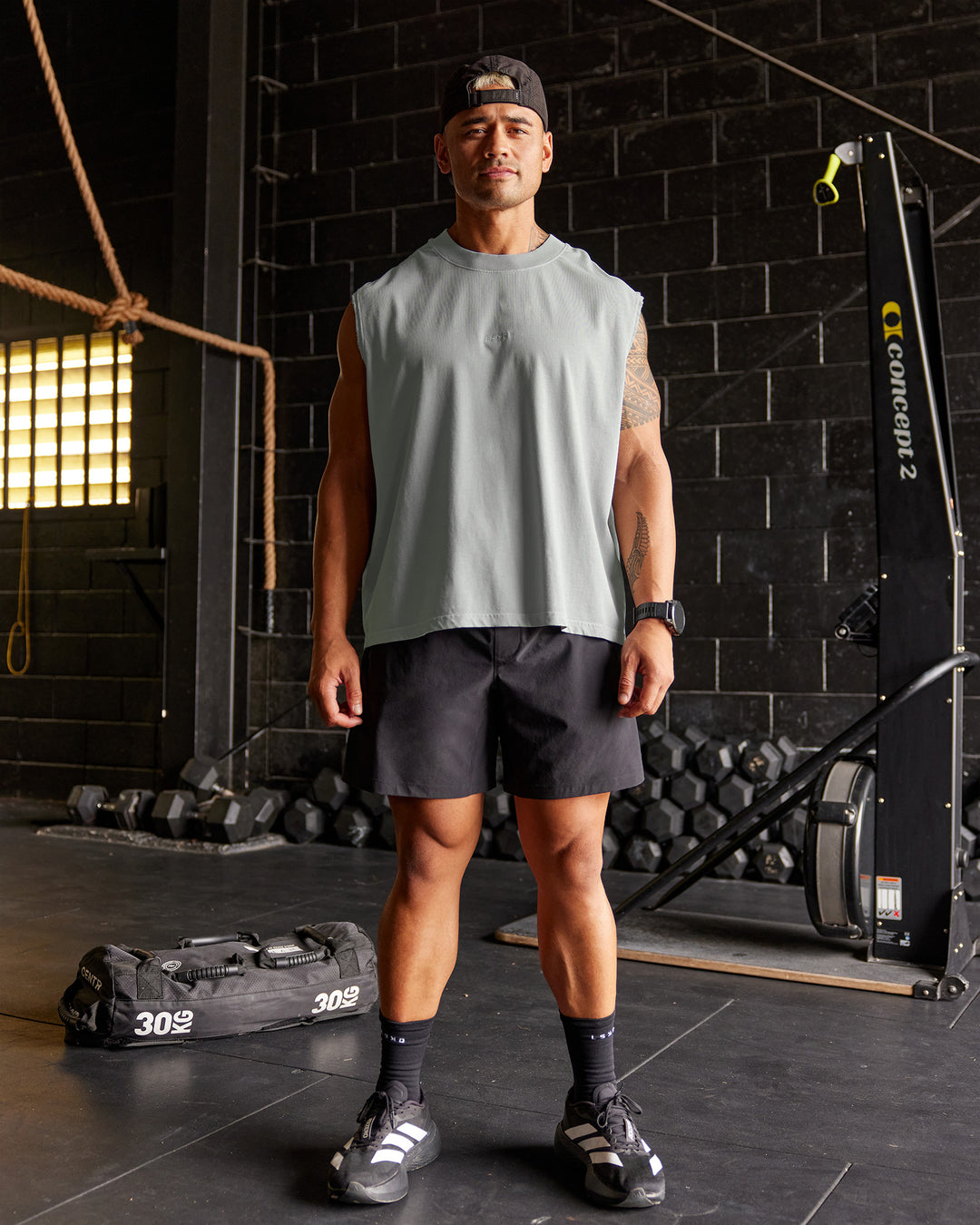 Man wearing Oversized Heavyweight Boxed Tank - Light Grey Marl | Model:Moses | Size:L