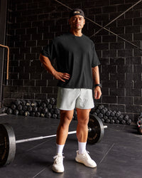 Man wearing Oversized Heavyweight Boxed Tee - Washed Black | Model:Moses | Size:L