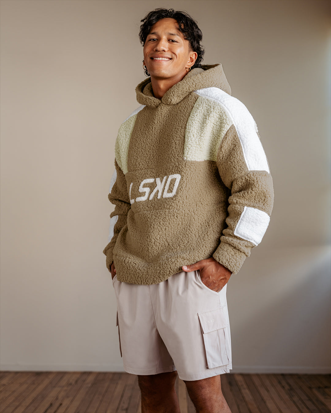 Man wearing Sherpa Slam Hoodie Oversized - Greige-Shale Beige-White | Size:L