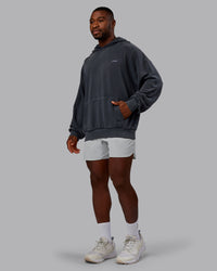 Man wearing 1% Better Value Series Oversized Hoodie - Black-Violet Ray | Model:Sam | Size:L