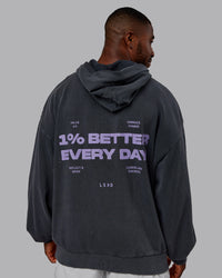 Man wearing 1% Better Value Series Oversized Hoodie - Black-Violet Ray | Model:Sam | Size:L