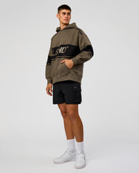 Man wearing A-Team Oversized Hoodie - Walnut Grey-Caviar | Model:Jackson | Size:L