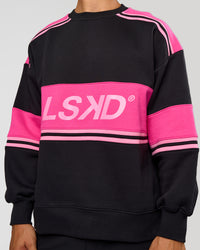 Man wearing A-Team Sweater Oversize - Caviar-Ultra Pink-Candy Pink | Model:Jackson | Size:L