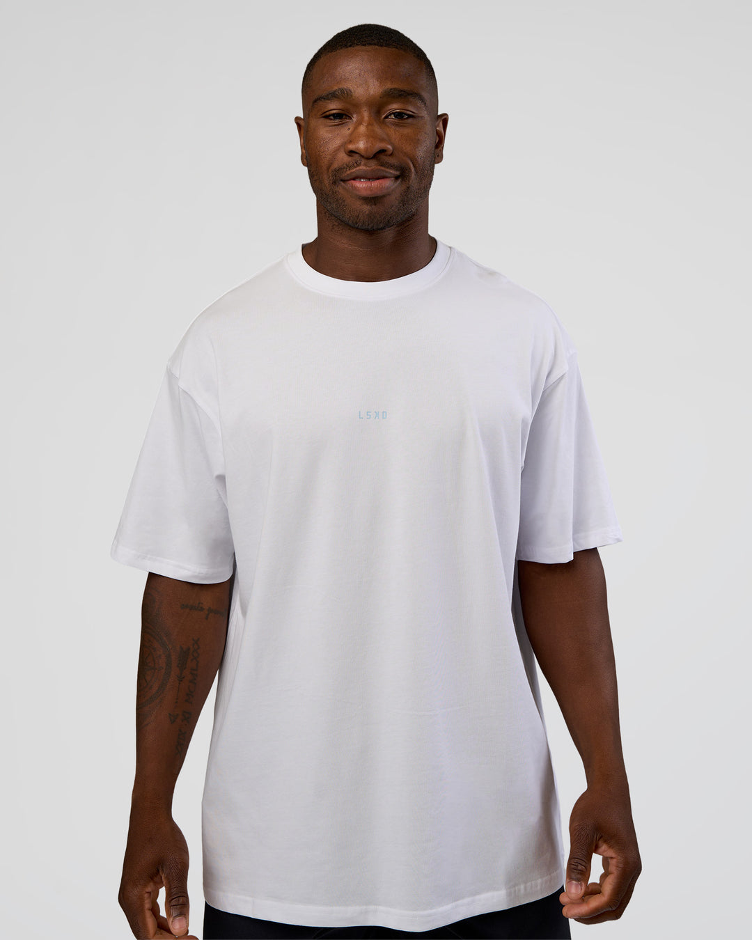 Man wearing Abstract Haze FLXCotton Tee - White-Blue Aura | Model:Sam | Size:L