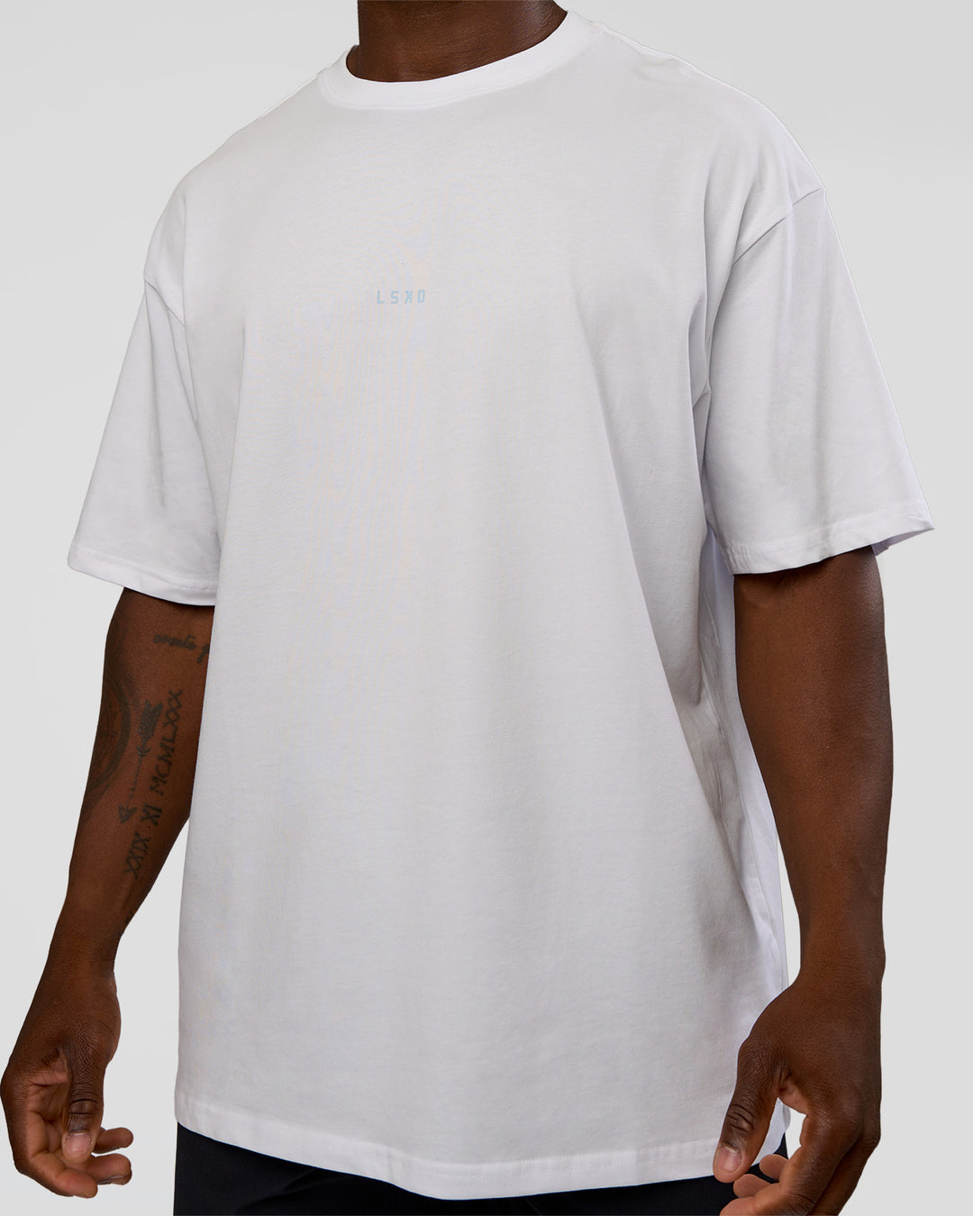 Man wearing Abstract Haze FLXCotton Tee - White-Blue Aura | Model:Sam | Size:L