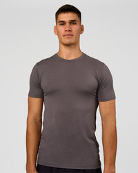 Man wearing AeroFLX+ Seamless Set In Tee - Duskstone/Duskstone | Model:Jackson | Size:L
