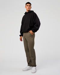 Man wearing AfterDark ZeroCrease Oversized Hoodie - Black | Model:Jackson | Size:L