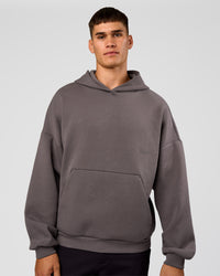 Man wearing AfterDark ZeroCrease Oversized Hoodie - Duskstone | Model:Jackson | Size:L