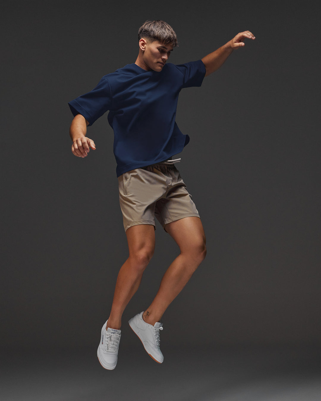 Man wearing AfterDark ZeroCrease Oversized Tee - Future Navy | Model:Jackson | Size:L