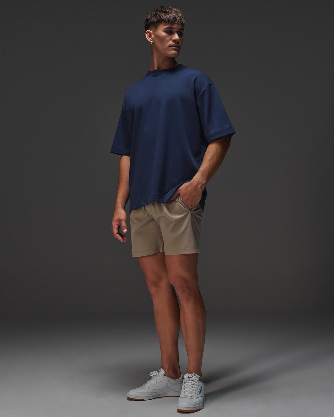 Man wearing AfterDark ZeroCrease Oversized Tee - Future Navy | Model:Jackson | Size:L