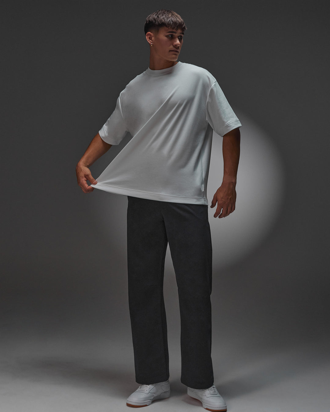 Man wearing AfterDark ZeroCrease Oversized Tee - White | Model:Jackson | Size:L
