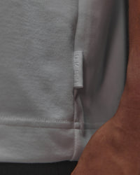 Man wearing AfterDark ZeroCrease Oversized Tee - White | Model:Jackson | Size:L