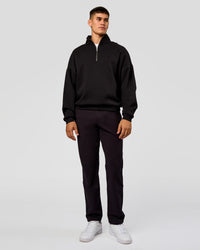 Man wearing AfterDark ZeroCrease Quarter Zip - Black | Model:Jackson | Size:L