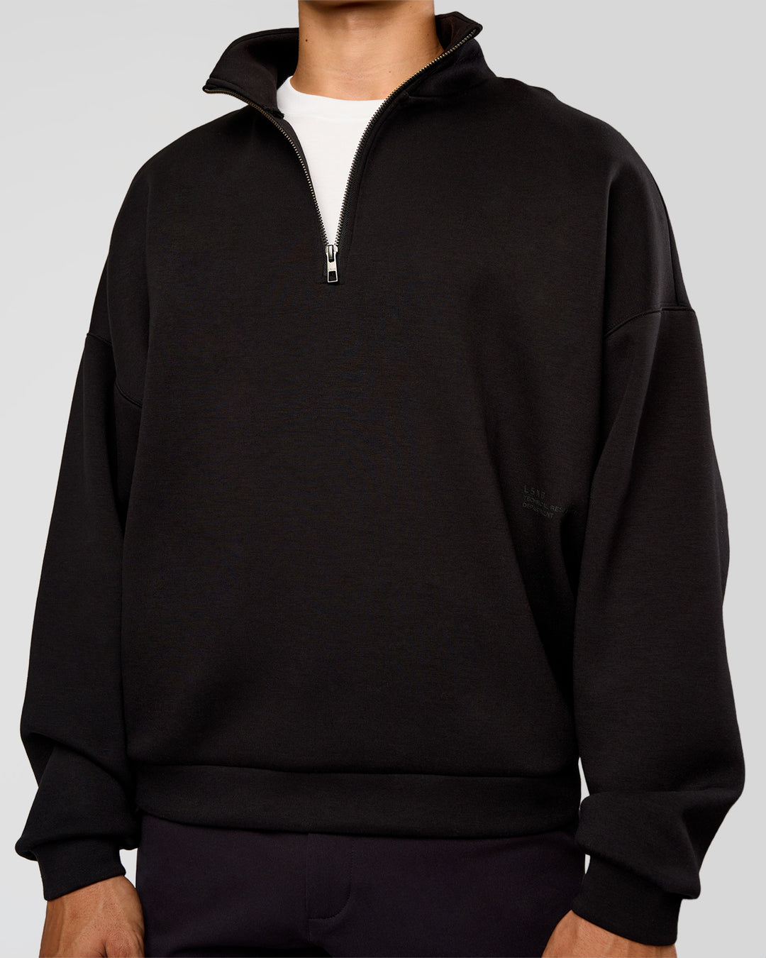 Man wearing AfterDark ZeroCrease Quarter Zip - Black | Model:Jackson | Size:L