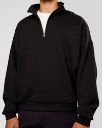 Man wearing AfterDark ZeroCrease Quarter Zip - Black | Model:Jackson | Size:L