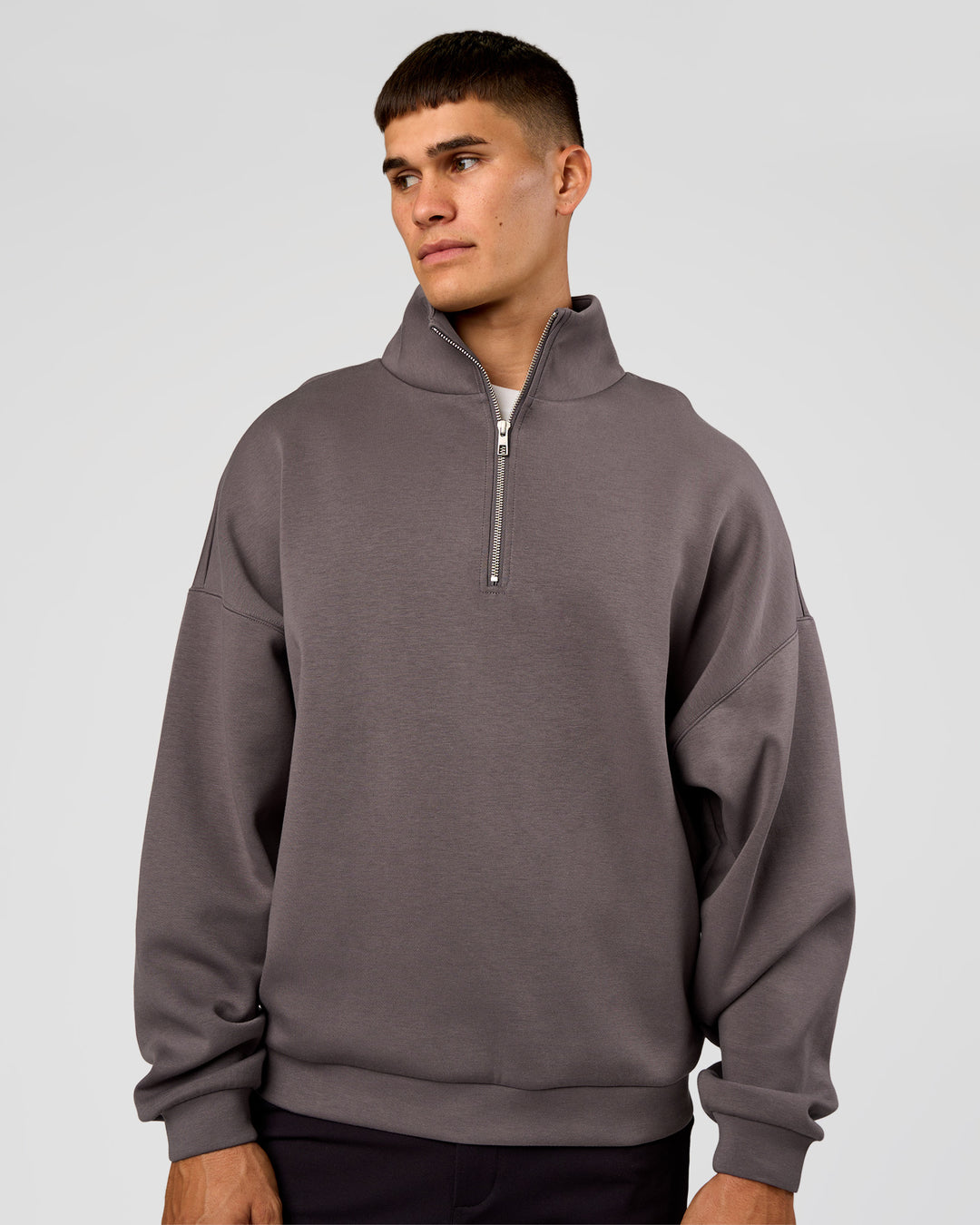 Man wearing AfterDark ZeroCrease Quarter Zip - Duskstone | Model:Jackson | Size:L
