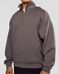 Man wearing AfterDark ZeroCrease Quarter Zip - Duskstone | Model:Jackson | Size:L