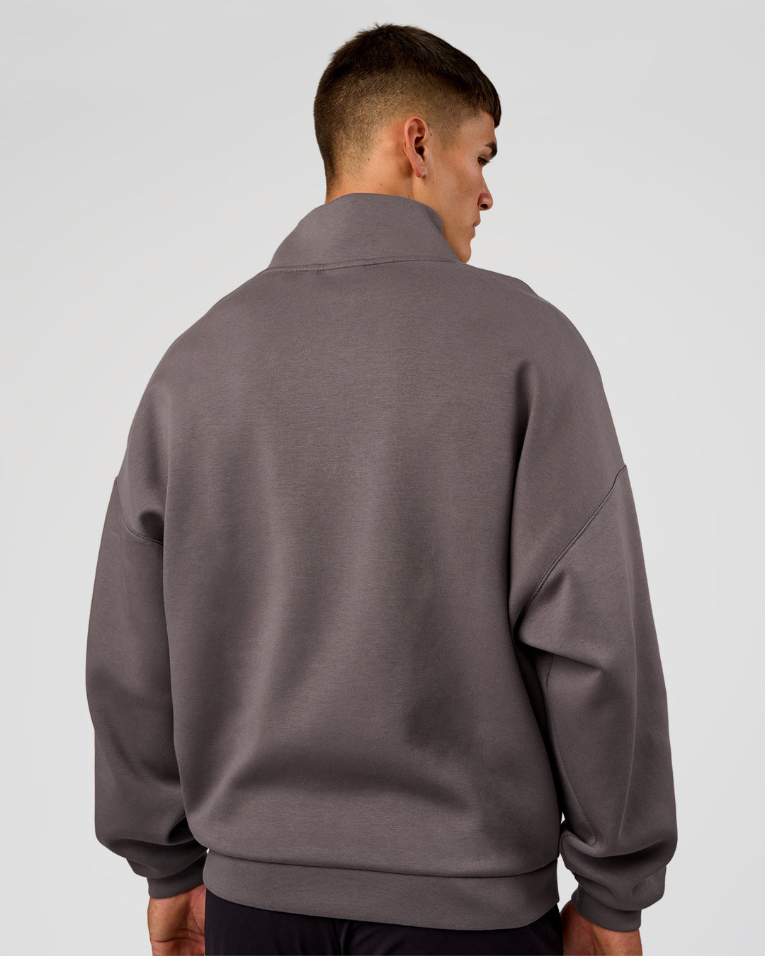 Man wearing AfterDark ZeroCrease Quarter Zip - Duskstone | Model:Jackson | Size:L