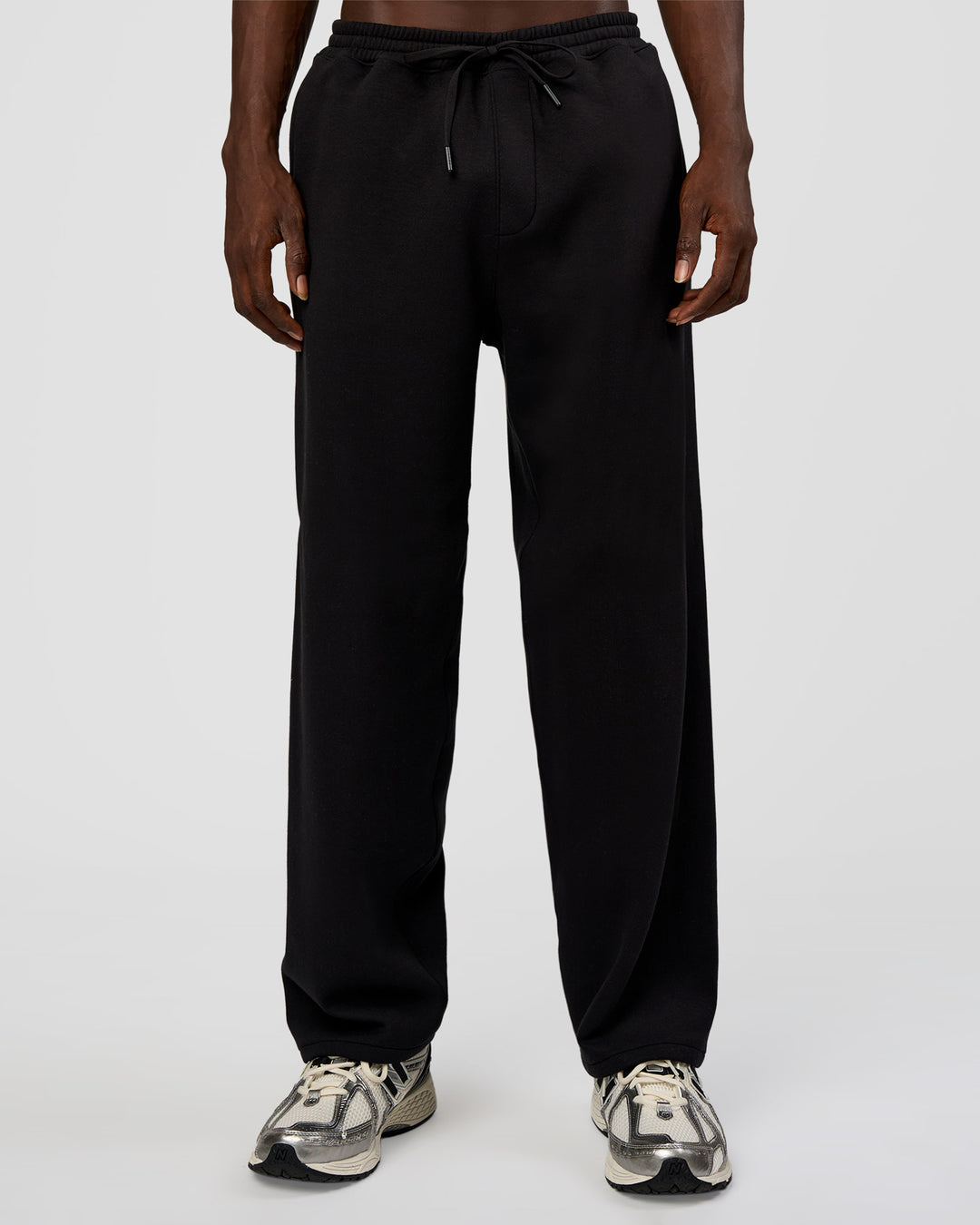 Man wearing AfterDark ZeroCrease Straight Leg Pant - Black | Model:Okello | Size:L
