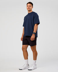 Man wearing All Day ZeroCrease™ Regular 8" Short - Black | Model:Liam | Size:34