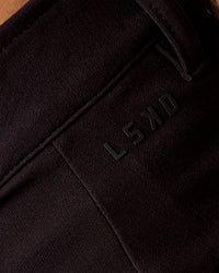 Man wearing All Day ZeroCrease™ Regular 8" Short - Black | Model:Liam | Size:34
