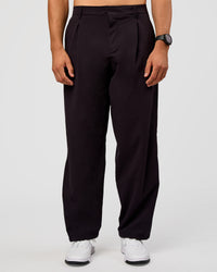 Man wearing All Day ZeroCrease™ Wide Leg Pant - Black | Model:Liam | Size:34