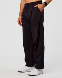 Man wearing All Day ZeroCrease™ Wide Leg Pant - Black | Model:Liam | Size:34