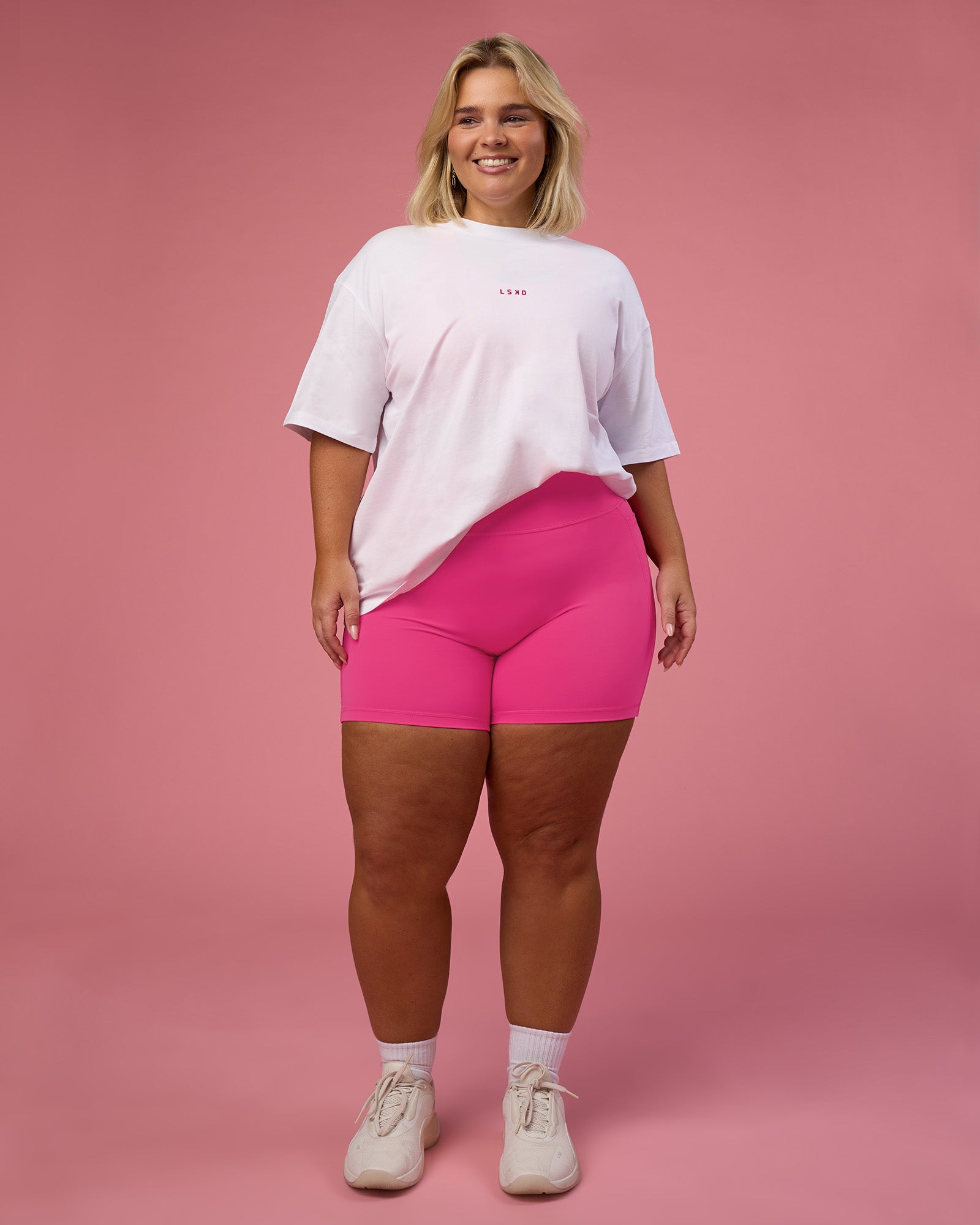 Woman wearing BCAM Go-To FLXCotton Oversized Tee - White-Ultra Pink | Model:Bianca | Size:L