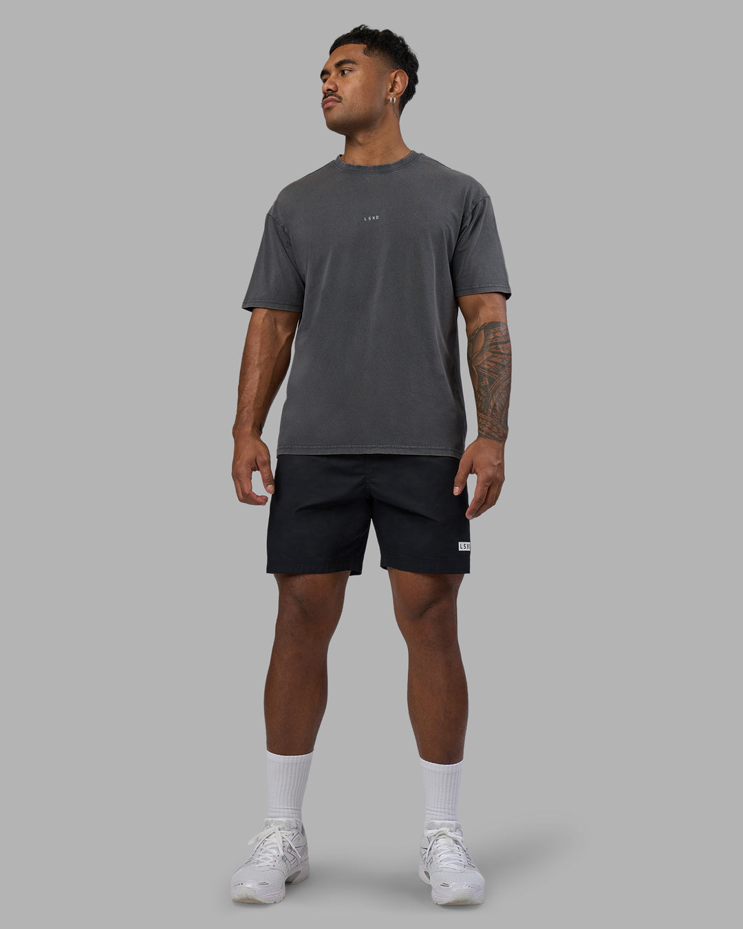 Man wearing Base FLXCotton Tee Oversized - Dark Storm Washed | Model:Xav | Size:L