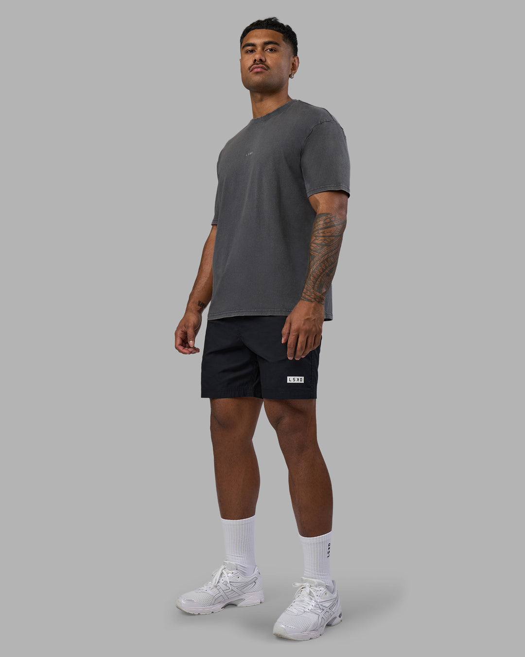 Man wearing Base FLXCotton Tee Oversized - Dark Storm Washed | Model:Xav | Size:L