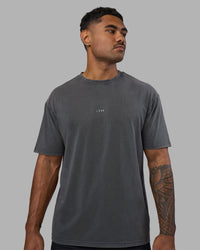 Man wearing Base FLXCotton Tee Oversized - Dark Storm Washed | Model:Xav | Size:L