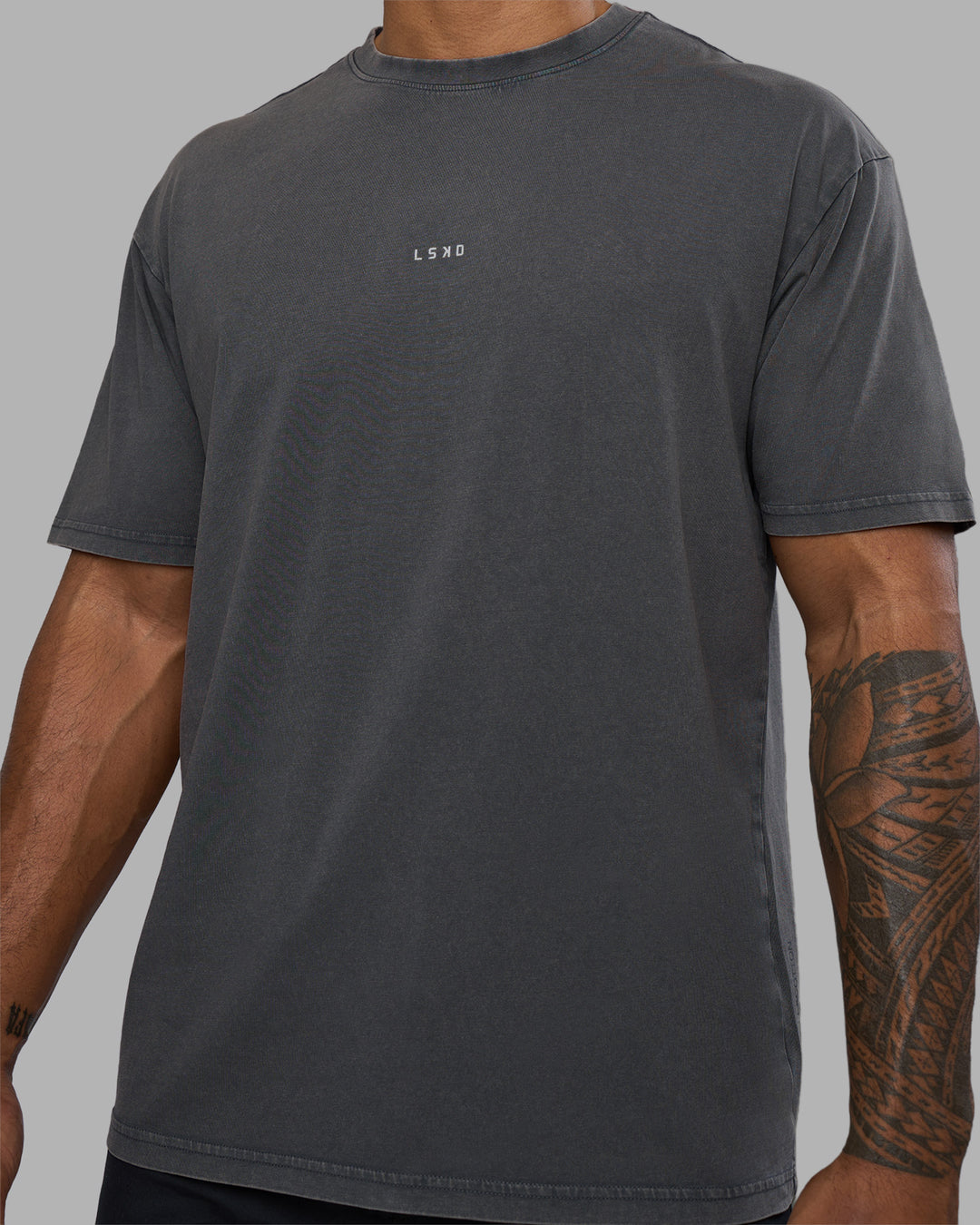 Man wearing Base FLXCotton Tee Oversized - Dark Storm Washed | Model:Xav | Size:L