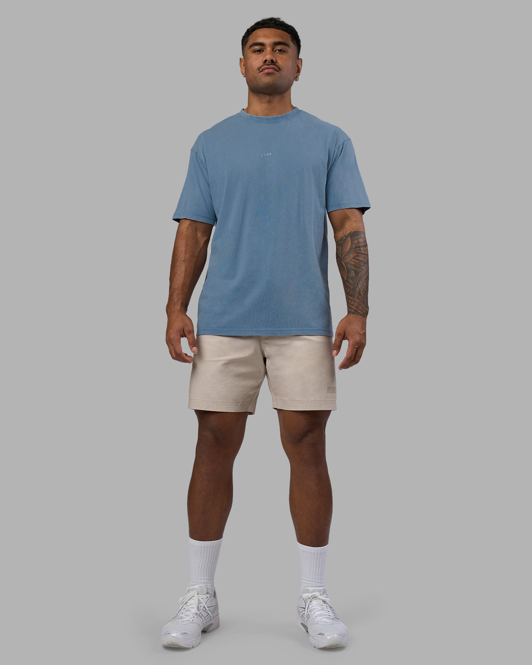 Man wearing Base FLXCotton Tee Oversized - Elemental Blue Washed | Model:Xav | Size:L