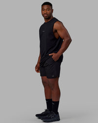 Man wearing Base FLXCotton Tank - Black | Model:Sam | Size:L