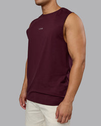 Man wearing Base FLXCotton Tank - Cherry Lacquer | Model:Kaelyb | Size:L