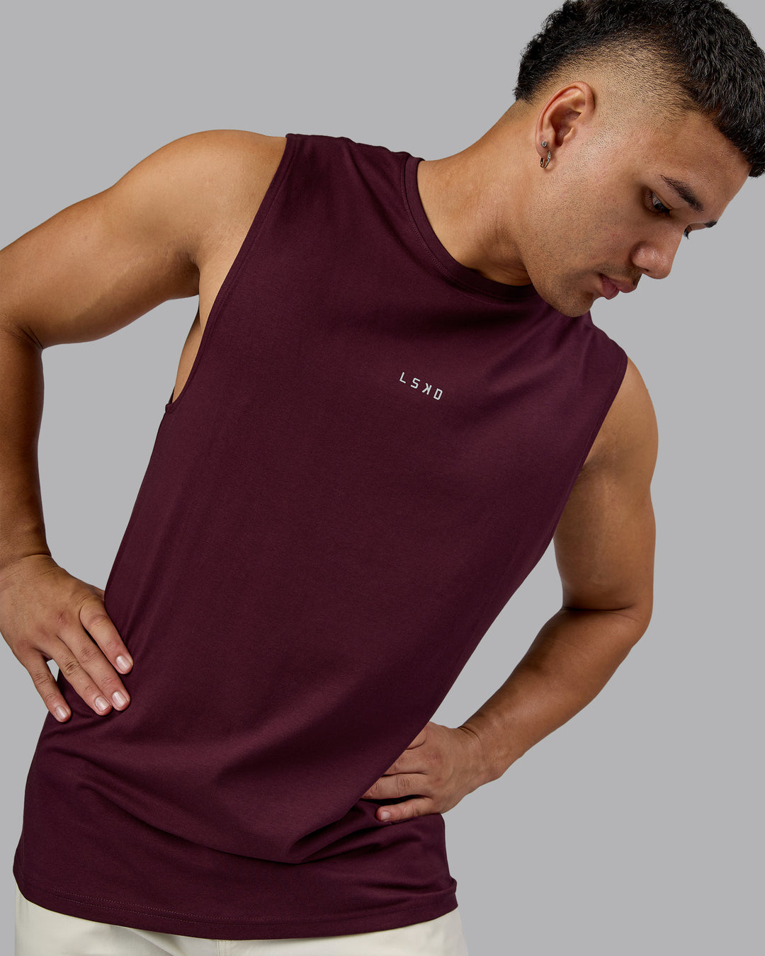 Man wearing Base FLXCotton Tank - Cherry Lacquer | Model:Kaelyb | Size:L