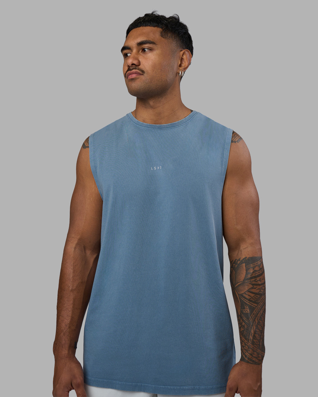 Man wearing Base FLXCotton Tank - Elemental Blue Washed | Model:Xav | Size:L