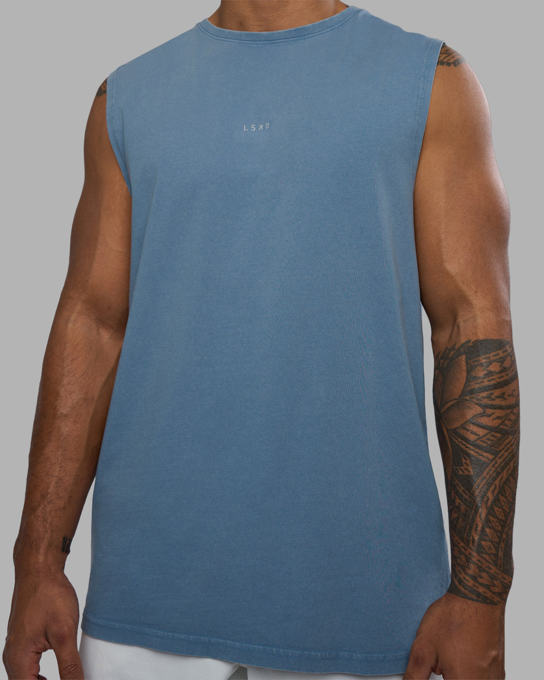Man wearing Base FLXCotton Tank - Elemental Blue Washed | Model:Xav | Size:L