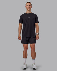 Man wearing Base FLXCotton Tee - Black | Model:Tom | Size:L